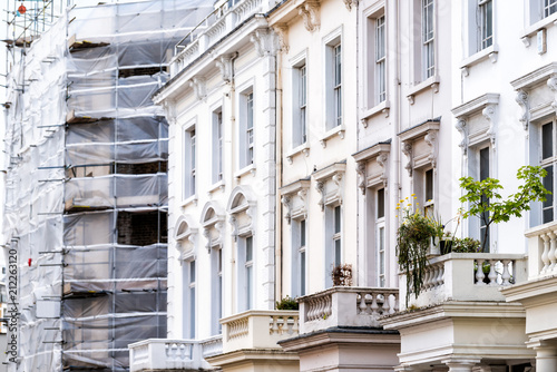 Photography Construction in London neighborhood district of Pimlico, scaffolding, contrast o