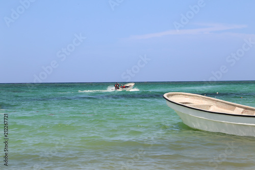 Boat on the shore of the ocean