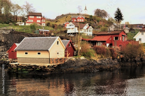 colorful cottages in a fjord's coast 