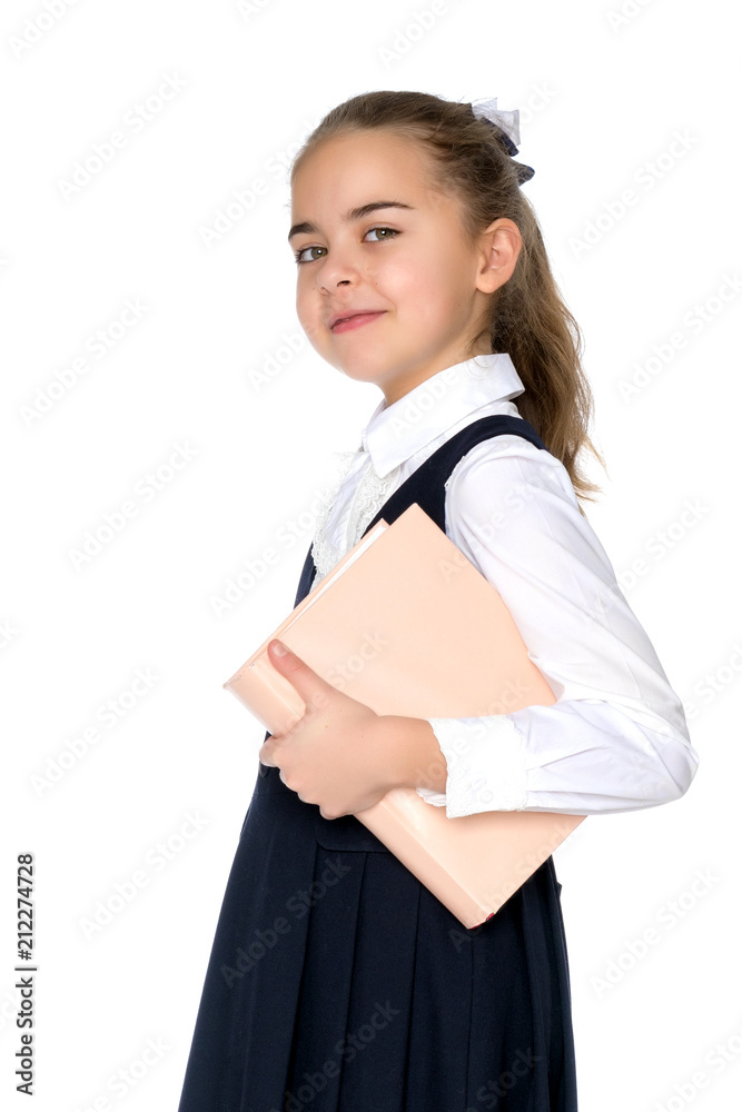 Girl schoolgirl with book.
