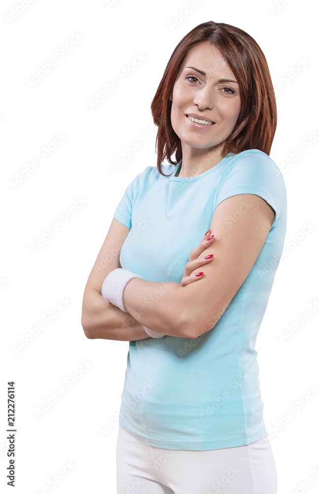 a beautiful smiling sporty woman with crossed arms looking at ca a beautiful smiling sporty woman with crossed arms looking at ca