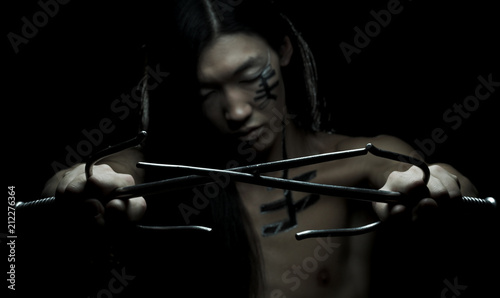 asian boy with weapons