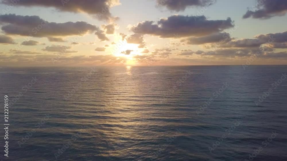 Aerial drone shot; beautiful, serene sunrise over the Atlantic ocean - simple push-in Aerial drone shot; beautiful, serene sunrise over the Atlantic ocean - simple push-in