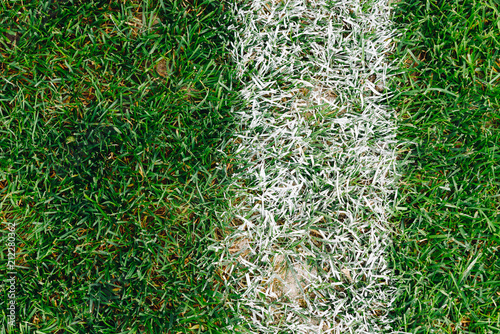 Close up of grass and marks on football or soccer field 2018
