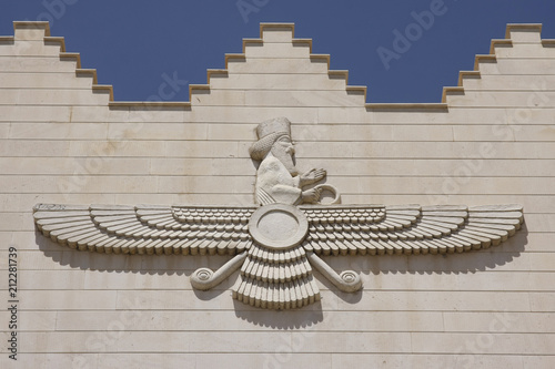 Faravahar symbol on a facade of the building in Kermanshah, Iran