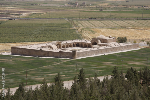 View of an ancient Silk Road caravanserai in Bisotun, Iran photo