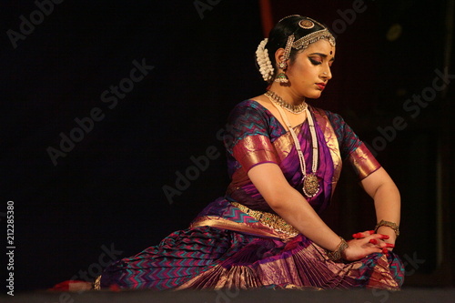 bharatha natyam,one of the eight classical dance forms of india.here the dancer during a stage performance