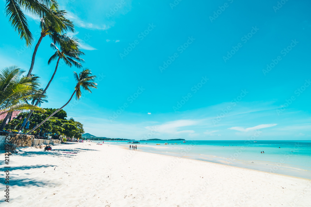 Beautiful tropical beach and sea with chair on blue sky