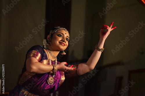 bharatha natyam,one of the eight classical dance forms of india.here the dancer during a stage performance photo