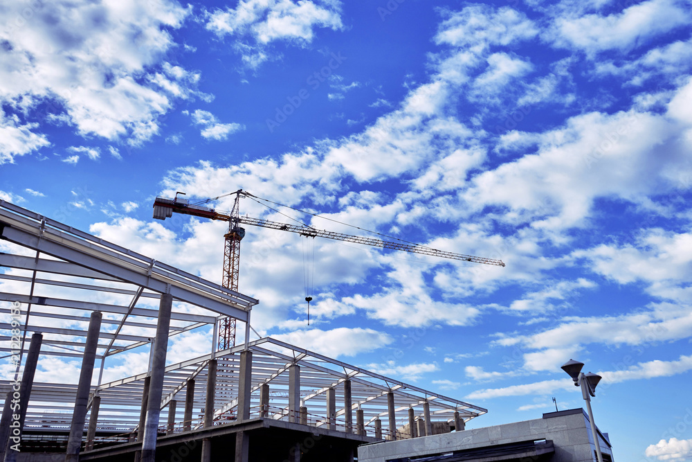 construction crane on blue sky background