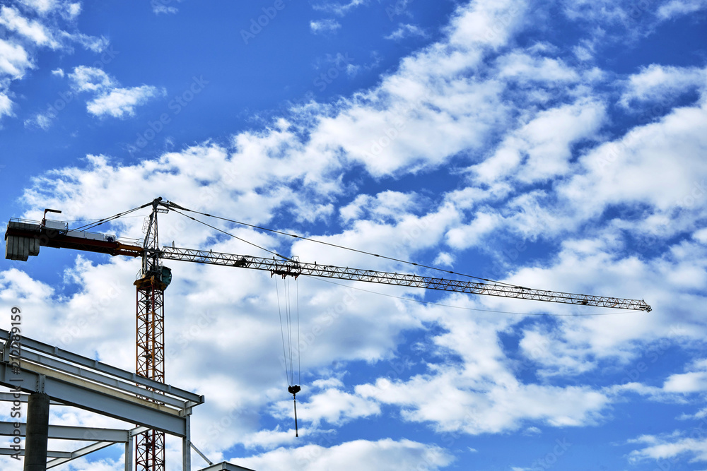 construction crane on blue sky background construction crane on blue sky background