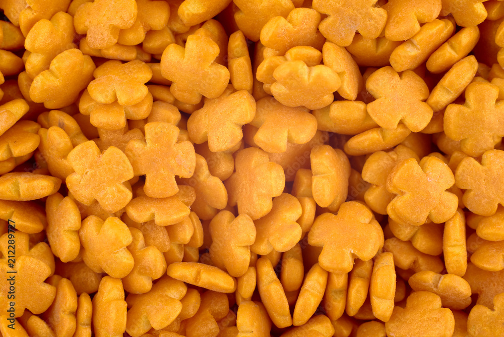 Orange candy background, copy space. Closeup of pile pastel candies. Candy texture. Candy pattern. Sweets background. Abstract background. Top view, flat lay Orange candy background, copy space. Closeup of pile pastel candies. Candy texture. Candy pattern. Sweets background. Abstract background. Top view, flat lay