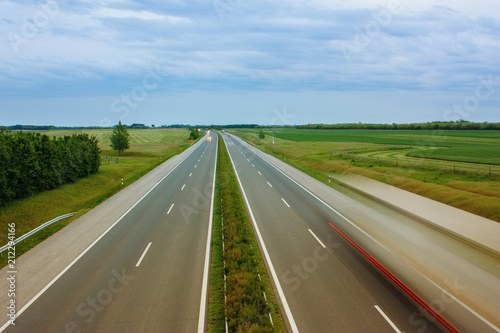 Long exposure photo of vehicle on motorway