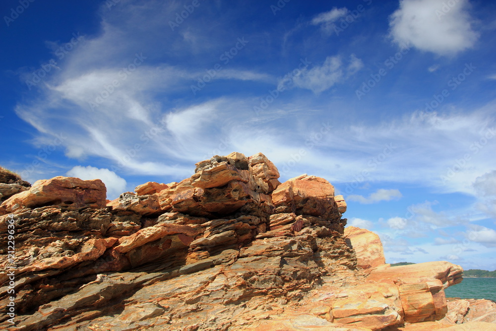 Old rocks and blue sky.Rayong Thailand