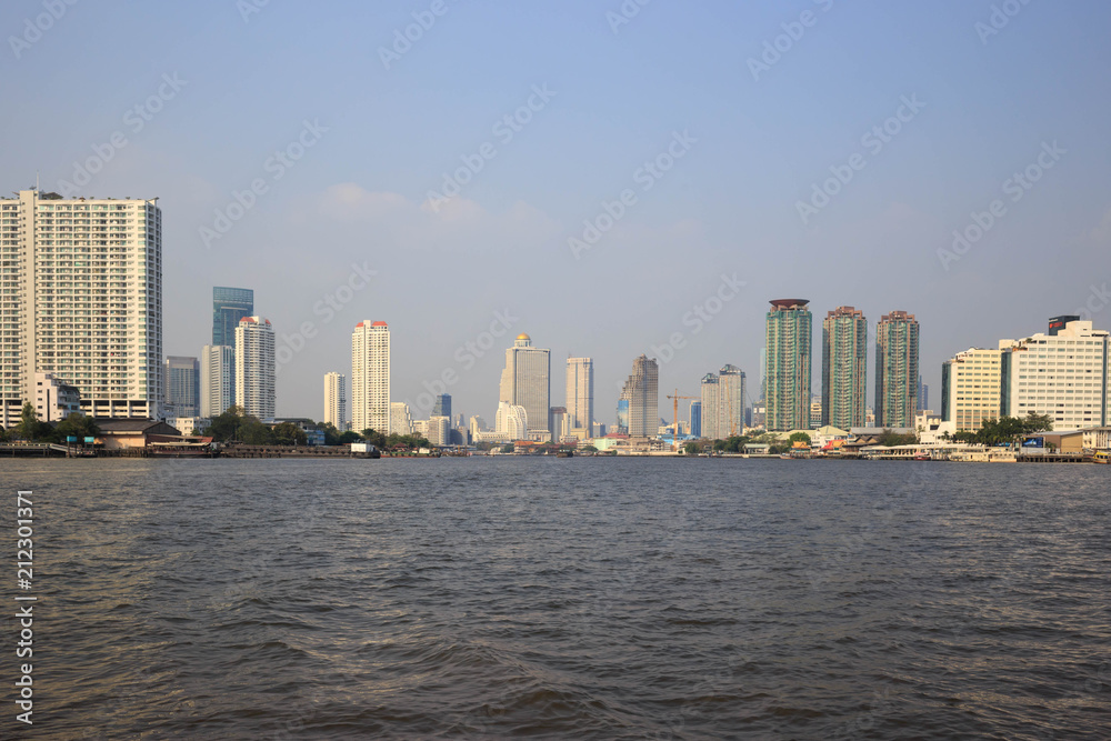 High rise apartment buildings along the Chao Phraya River in Bangkok, Thailand High rise apartment buildings along the Chao Phraya River in Bangkok, Thailand