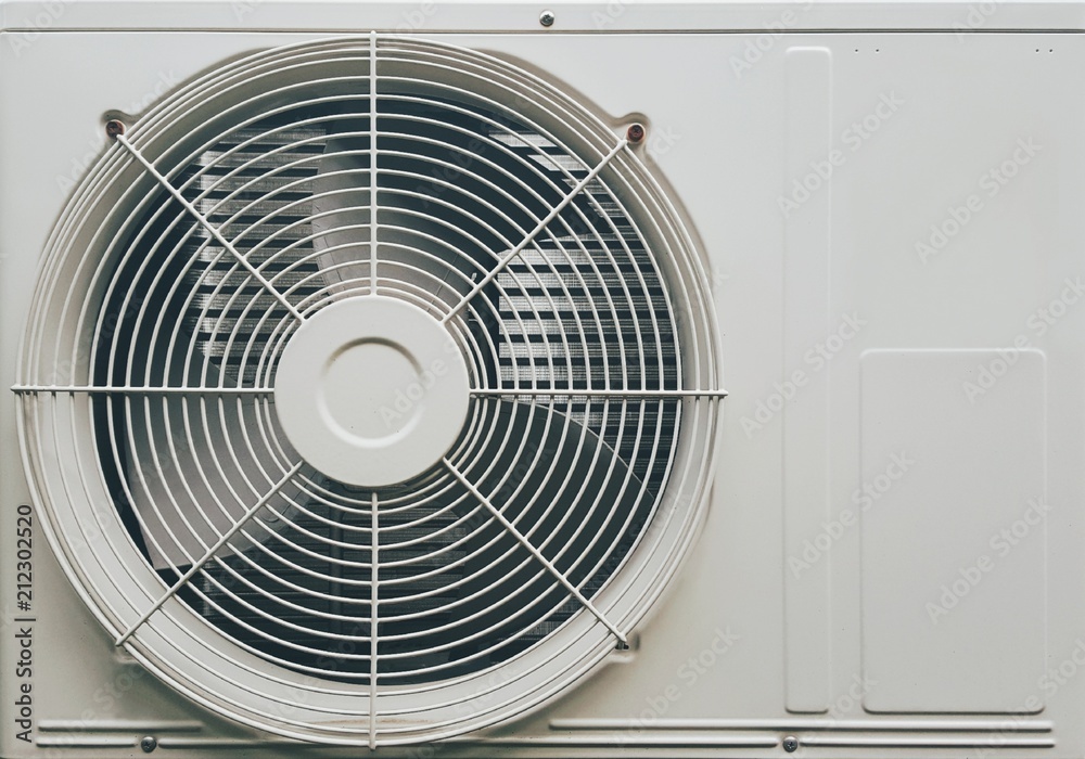 Close up compressor air conditioner.Compressor's protection grid Close up compressor air conditioner.Compressor's protection grid
