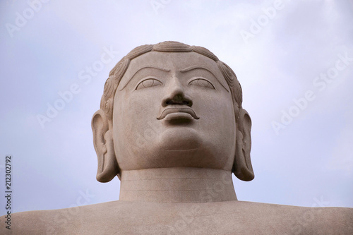 A gigiantic monolithic statue of Bahubali, also known as Gomateshwara, Vindhyagiri Hill, Shravanbelgola, Karnataka. View from the temple courtyard. photo