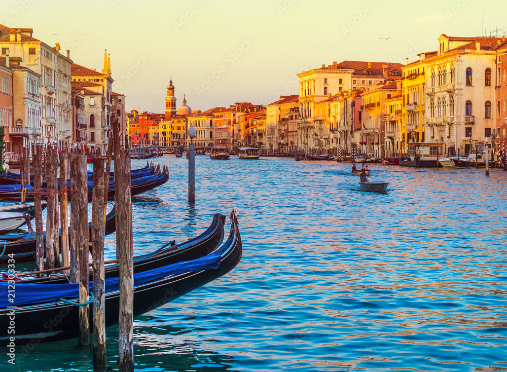sunset in Venice, the evening scenery of the Venetian canal with gondolas