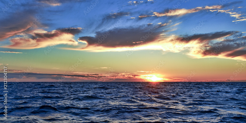 Golden colored blue Sky Sunrise Seascape. Australia