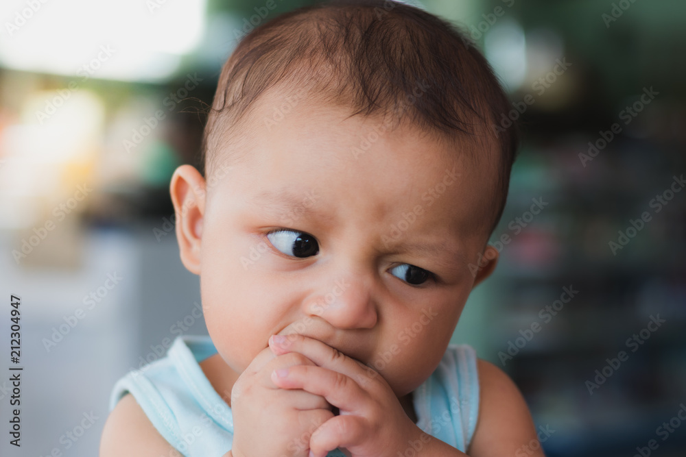 baby boy  sucking fingers