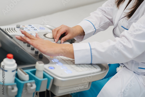 Ultrasound medical device for diagnostics. The procedure of ultrasound examination. Diagnosis and research of diseases with help of ultrasound of abdomen and give to pregnant women of the hospital.