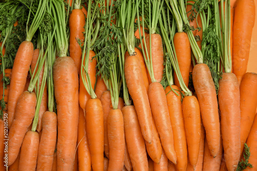 Ripe carrots as background, top view. Healthy diet