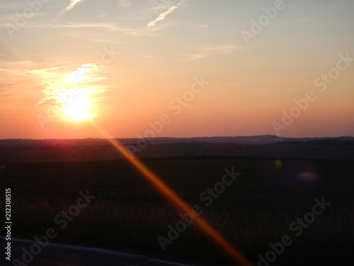 sunset in a flat czech landscape © luciezr