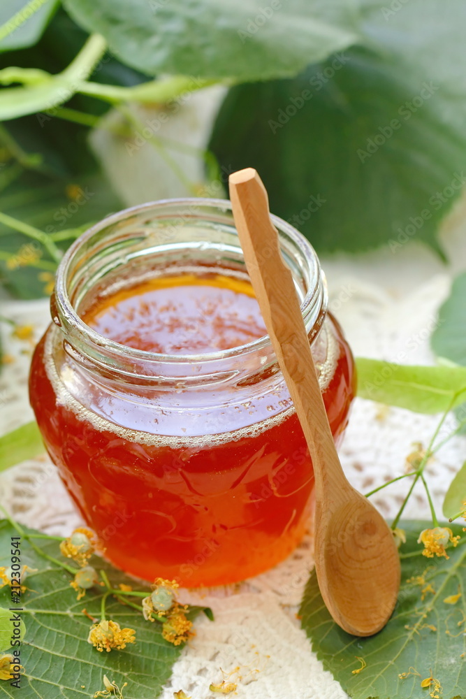 Linden honey in glass jar Linden honey in glass jar