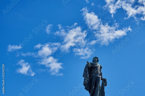 Monument to King Gustav III of Sweden and blue cloudy sky, Stockholm Sweden. 