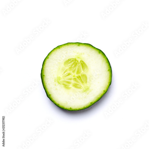 A slice of Cucumber on White Background. Close up. Top view.