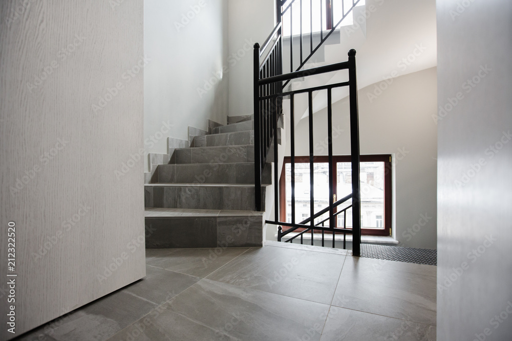 Obraz premium Look from above at the stairways going down as the spiral