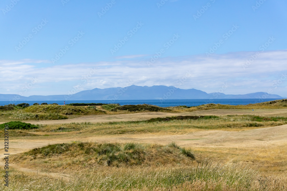 Ayrshire Golf Course to Arran hills in the hazey distance.