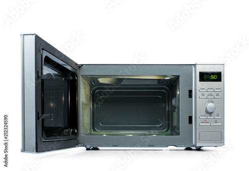 Microwave oven with door open, isolated on white background.