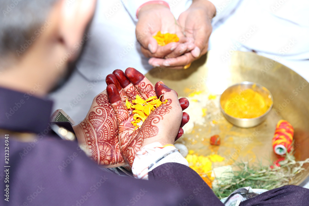Cultural Indian Wedding with roli and Flowers & rice