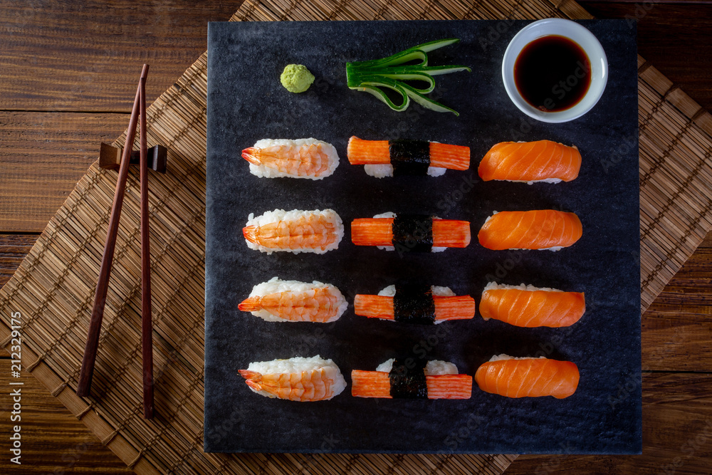 Japanese seafood sushi on black background Japanese seafood sushi on black background