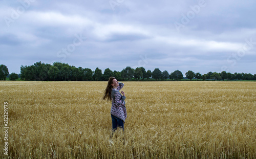 Girl in the wheat field.