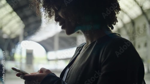 Young traveler on railroad station
