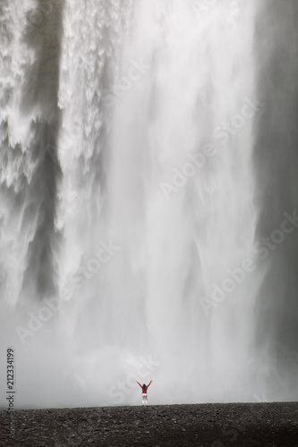 Human at waterfall