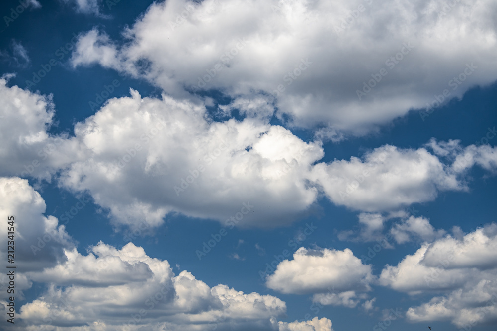 Summer blue sky and clouds background