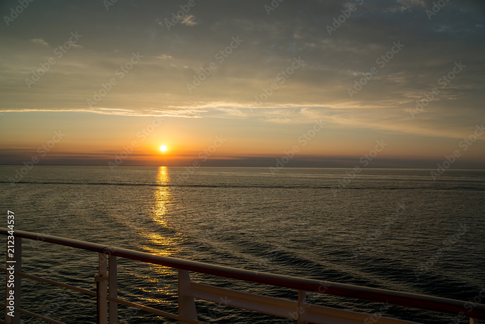 stunning sunset over the ocean seen from a cruiseship