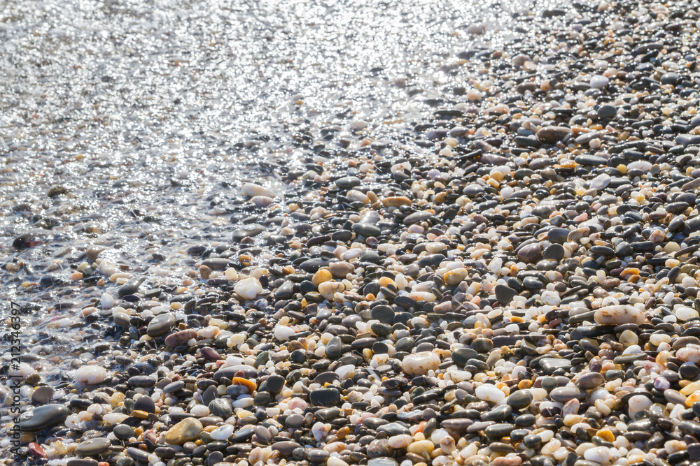 Sea stones on the seashore in the summer Sea stones on the seashore in the summer
