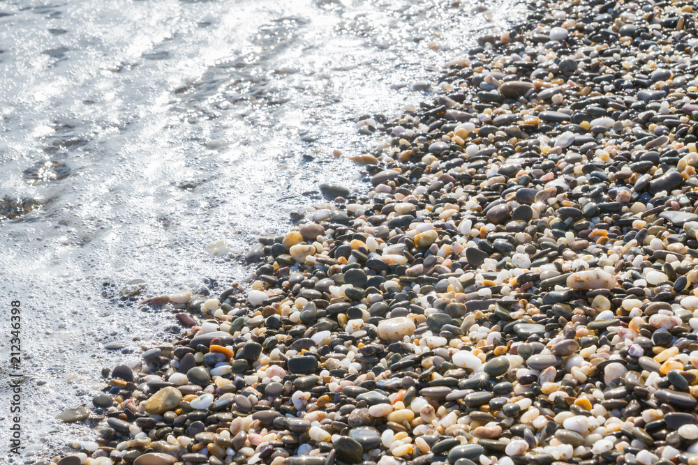 Sea stones on the seashore in the summer Sea stones on the seashore in the summer