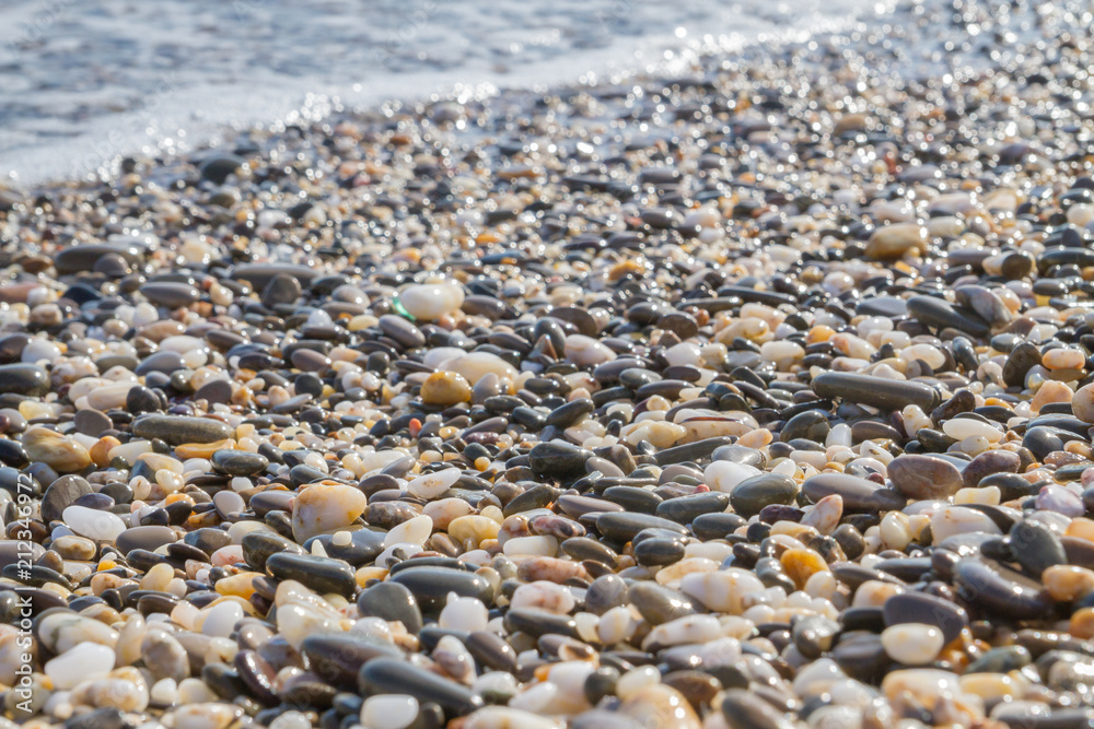 Sea stones on the seashore in the summer Sea stones on the seashore in the summer