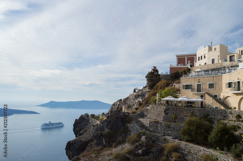 Houses on Cliffs with Sea View and Cruise Ship in Fira, Santorini, Cyclades, Greece