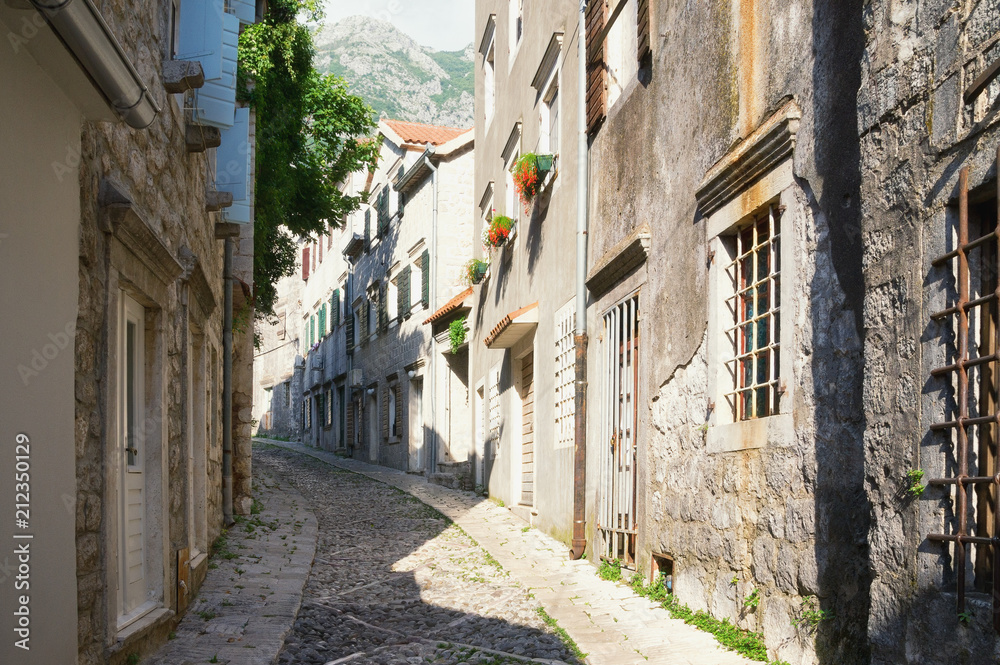 Beautiful cobblestone street. Montenegro, town of Risan, Gabela street