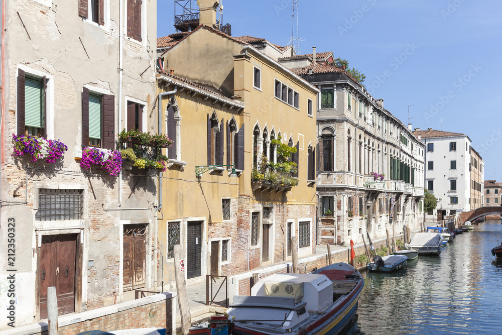 Picturesque Rio di Santa Caterina, Cannaregio, Venice, Italy with reflections on the canal and boats