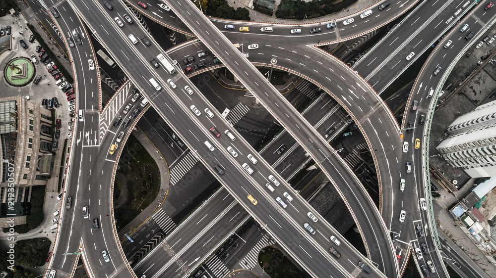 Aerial view of highway and overpass in city on a cloudy day Aerial view of highway and overpass in city on a cloudy day
