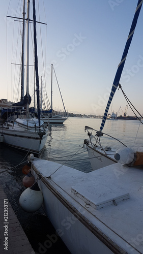 Preveza city boats ships masts in the dusk Greece