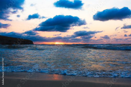 Sea beach and on sunset sky