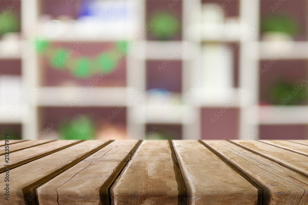 Wooden tablet on interior background Wooden tablet on interior background